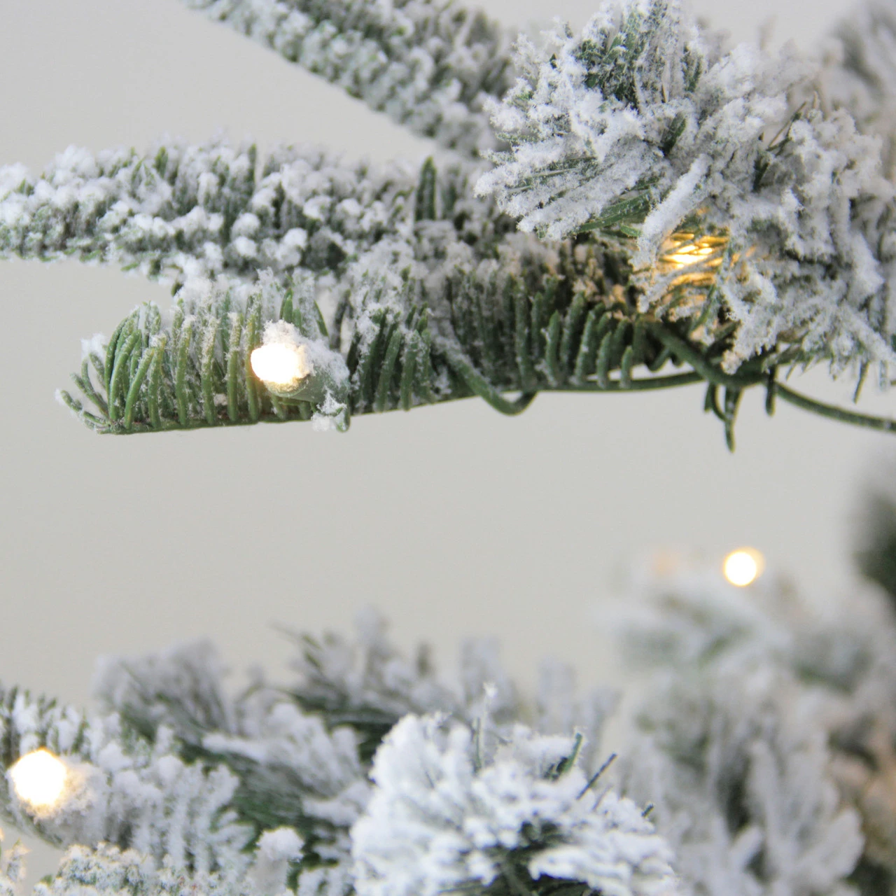 Northlight 4.5 Ft Pre-Lit Nordmann Fir Artificial Flocked Christmas Tree - Warm Clear LED Lights 4 Northlight 4.5 Ft Pre-Lit Nordmann Fir Artificial Flocked Christmas Tree - Warm Clear LED Lights - Image 2